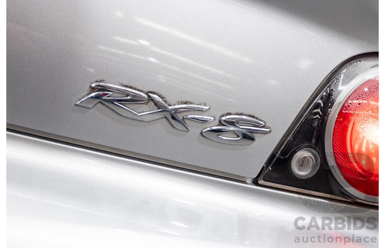 9/2005 Mazda RX-8 FE Series 1 4d Coupe Sunlight Silver Metallic 1.3L