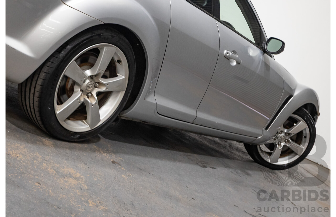 9/2005 Mazda RX-8 FE Series 1 4d Coupe Sunlight Silver Metallic 1.3L
