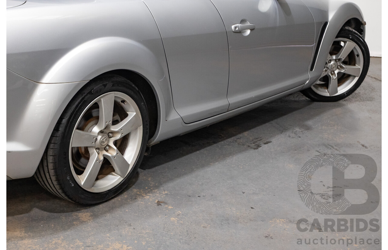 9/2005 Mazda RX-8 FE Series 1 4d Coupe Sunlight Silver Metallic 1.3L