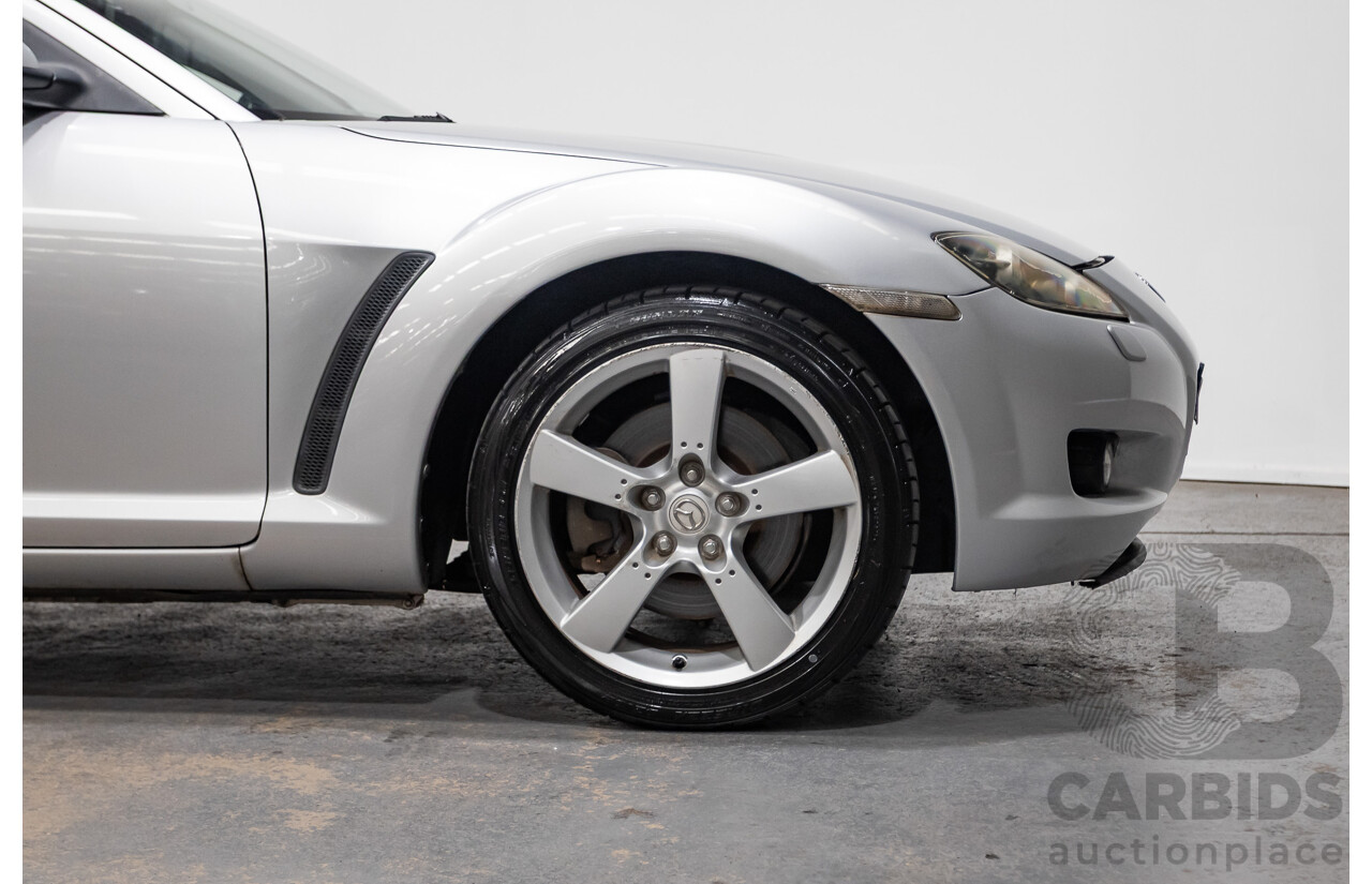 9/2005 Mazda RX-8 FE Series 1 4d Coupe Sunlight Silver Metallic 1.3L