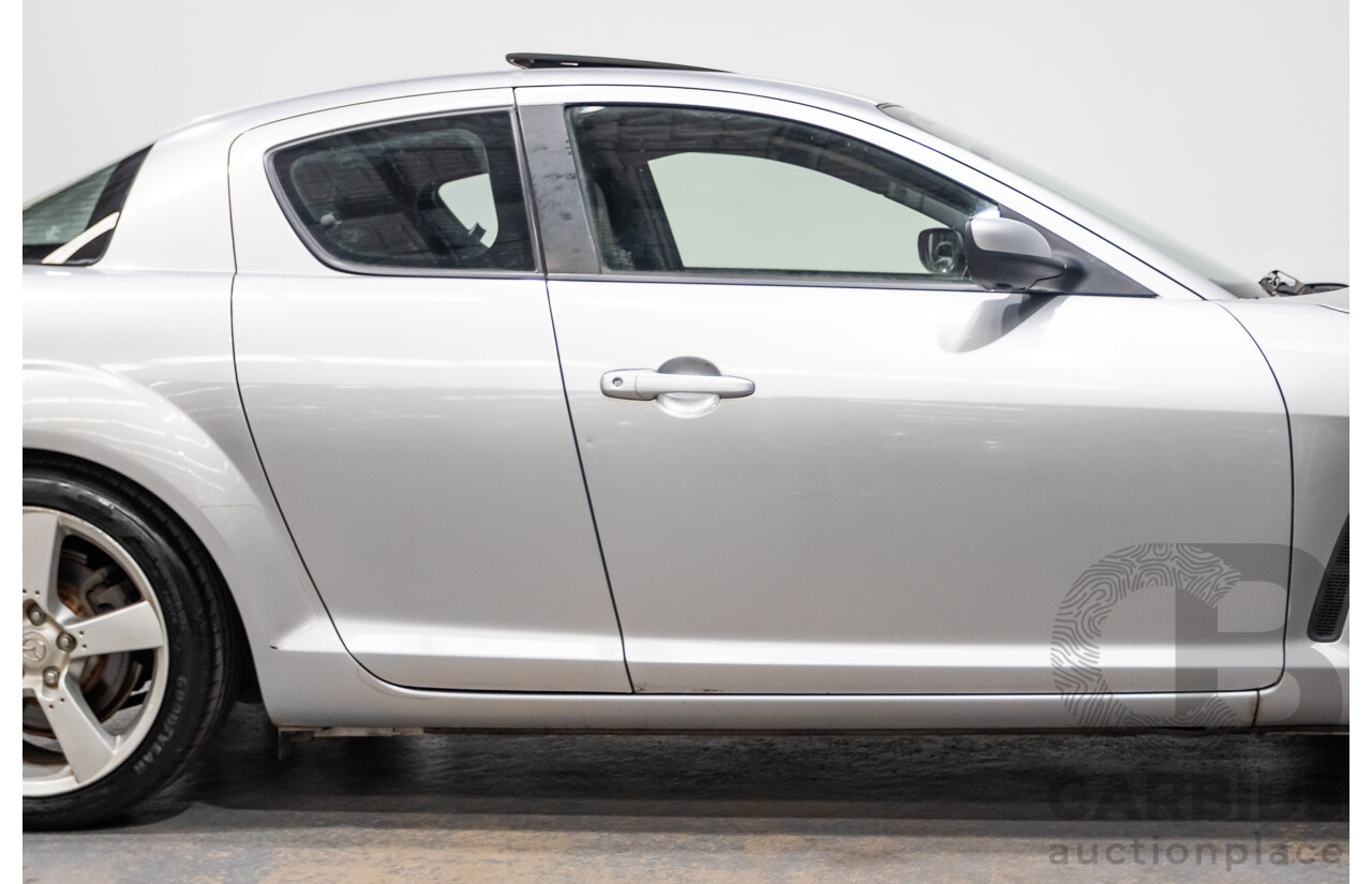 9/2005 Mazda RX-8 FE Series 1 4d Coupe Sunlight Silver Metallic 1.3L