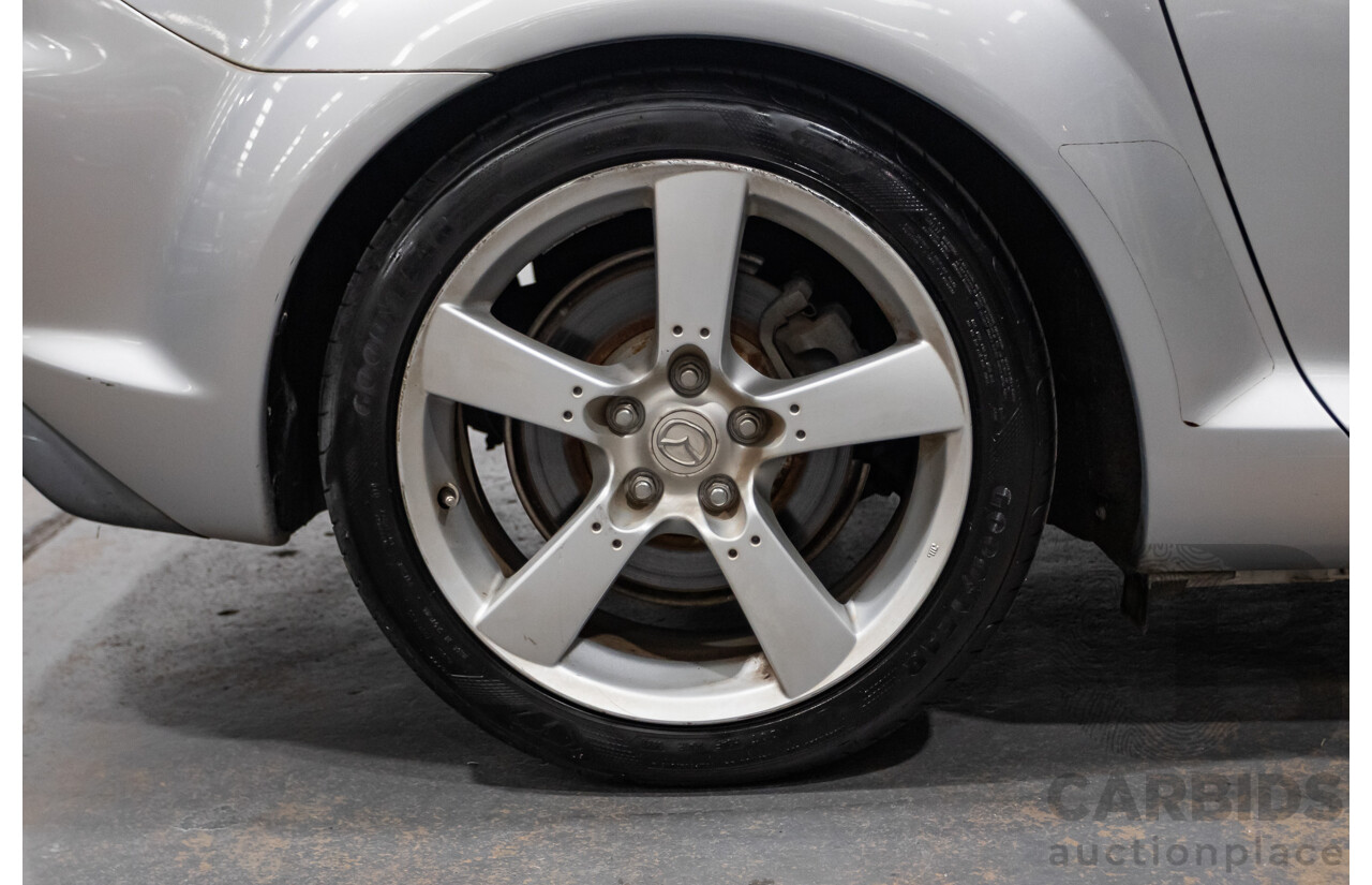 9/2005 Mazda RX-8 FE Series 1 4d Coupe Sunlight Silver Metallic 1.3L