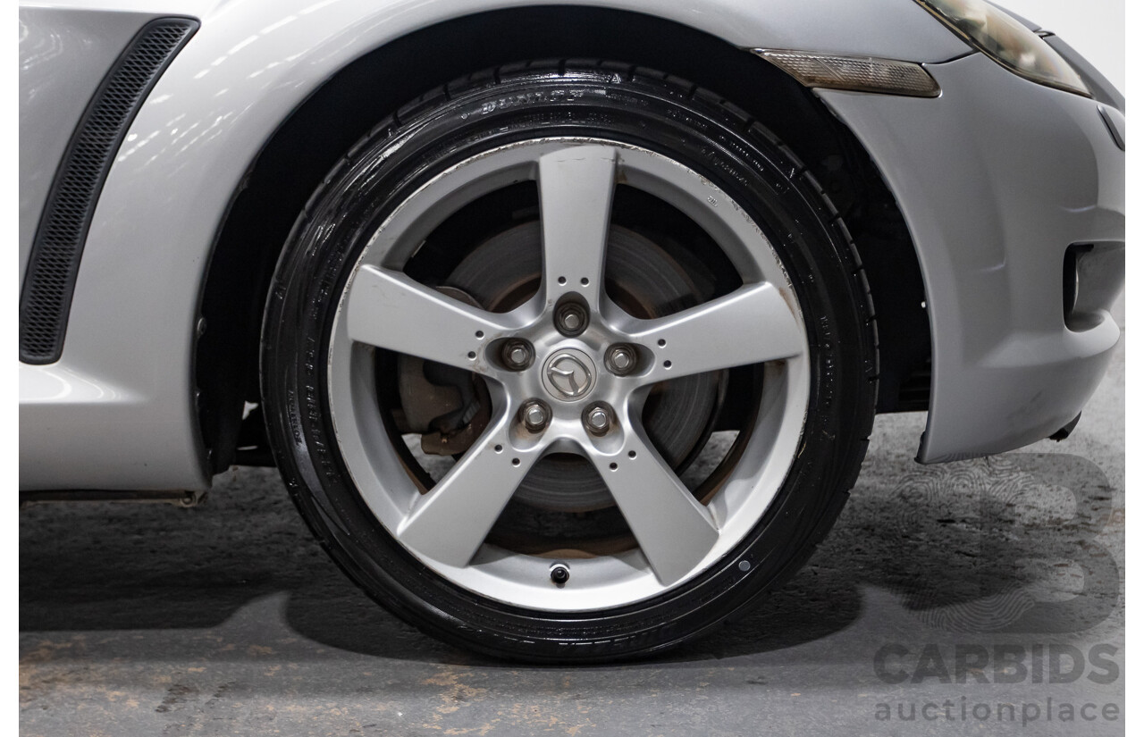 9/2005 Mazda RX-8 FE Series 1 4d Coupe Sunlight Silver Metallic 1.3L