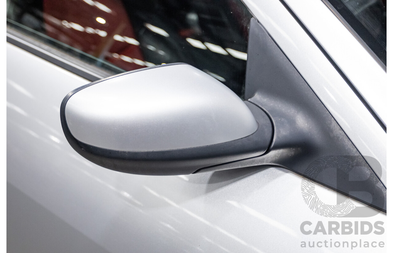 9/2005 Mazda RX-8 FE Series 1 4d Coupe Sunlight Silver Metallic 1.3L