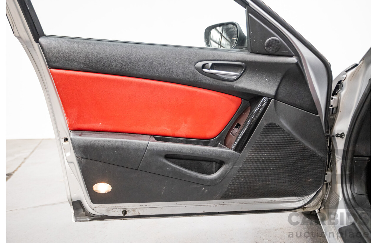 9/2005 Mazda RX-8 FE Series 1 4d Coupe Sunlight Silver Metallic 1.3L