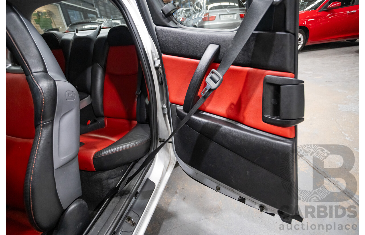 9/2005 Mazda RX-8 FE Series 1 4d Coupe Sunlight Silver Metallic 1.3L