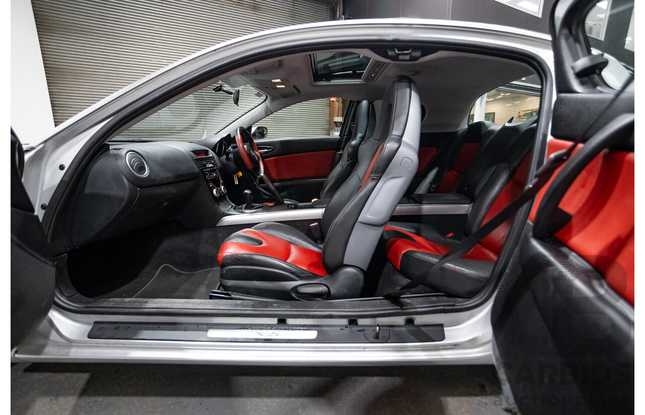 9/2005 Mazda RX-8 FE Series 1 4d Coupe Sunlight Silver Metallic 1.3L