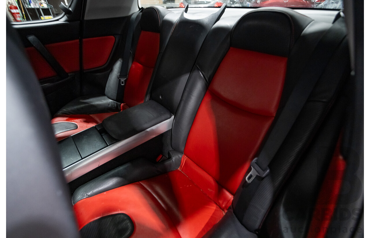 9/2005 Mazda RX-8 FE Series 1 4d Coupe Sunlight Silver Metallic 1.3L