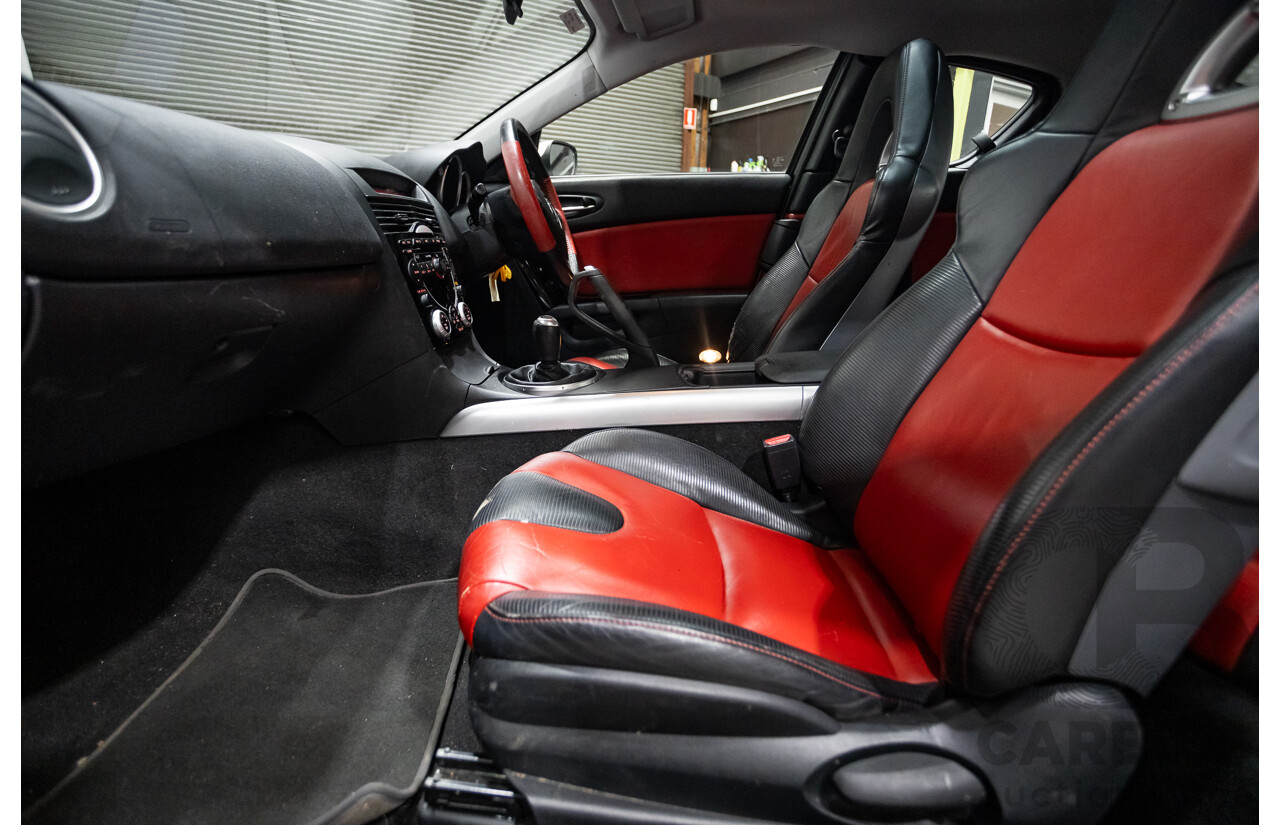 9/2005 Mazda RX-8 FE Series 1 4d Coupe Sunlight Silver Metallic 1.3L