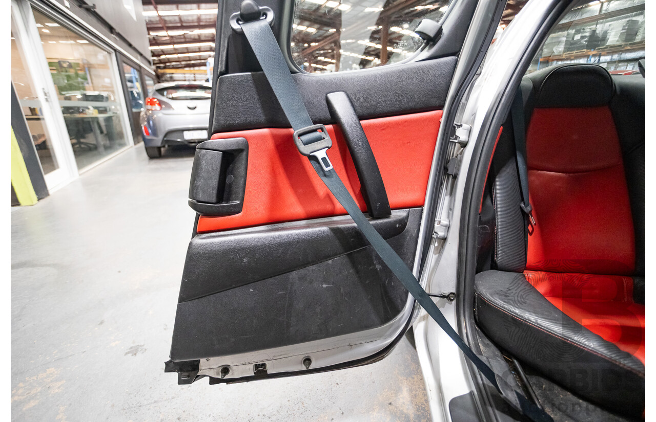 9/2005 Mazda RX-8 FE Series 1 4d Coupe Sunlight Silver Metallic 1.3L