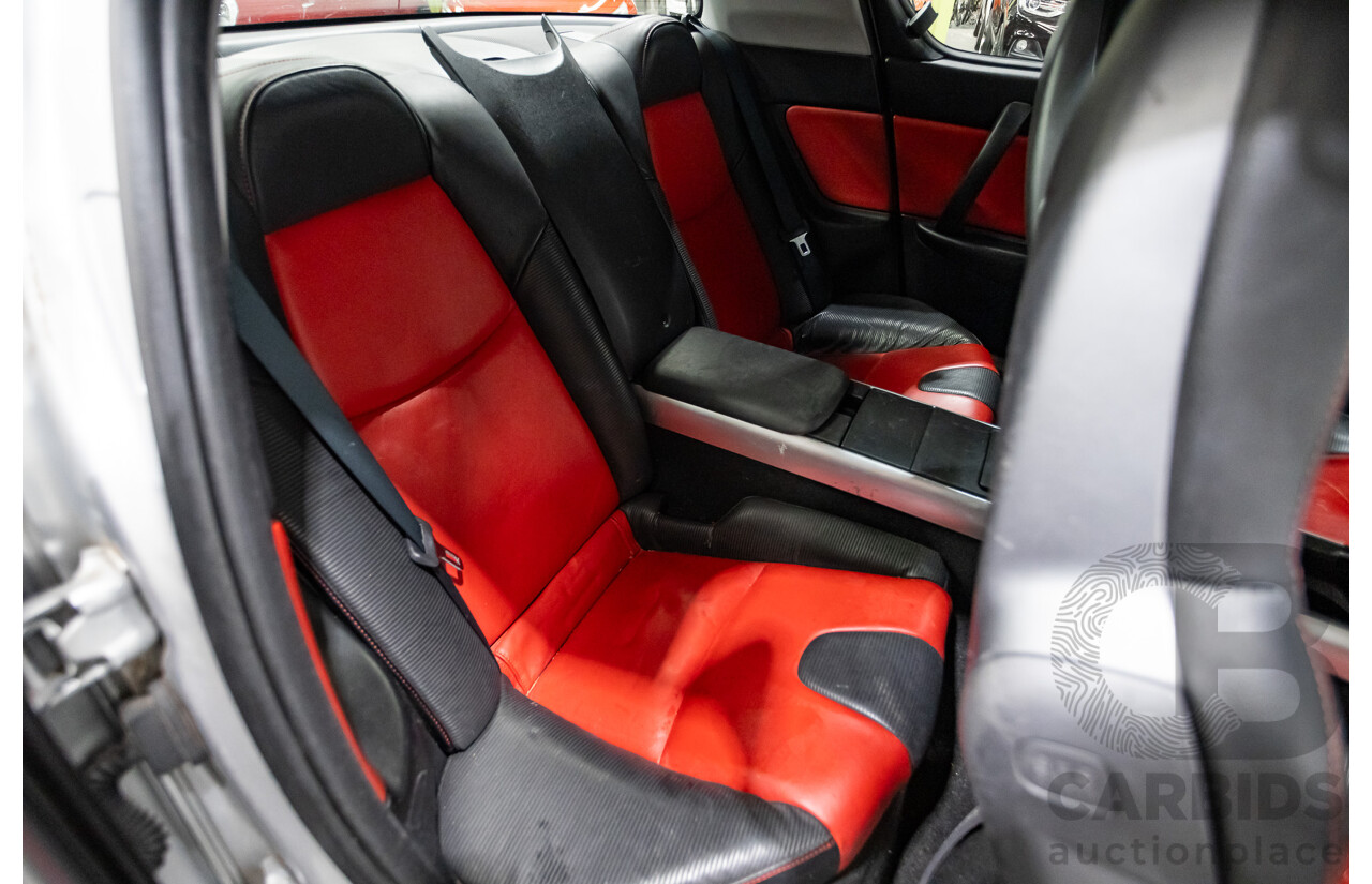 9/2005 Mazda RX-8 FE Series 1 4d Coupe Sunlight Silver Metallic 1.3L