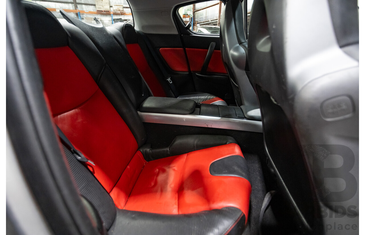 9/2005 Mazda RX-8 FE Series 1 4d Coupe Sunlight Silver Metallic 1.3L