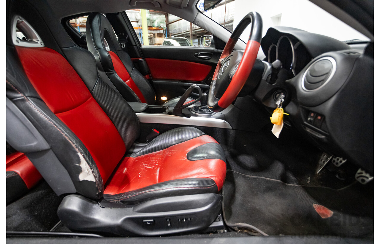 9/2005 Mazda RX-8 FE Series 1 4d Coupe Sunlight Silver Metallic 1.3L