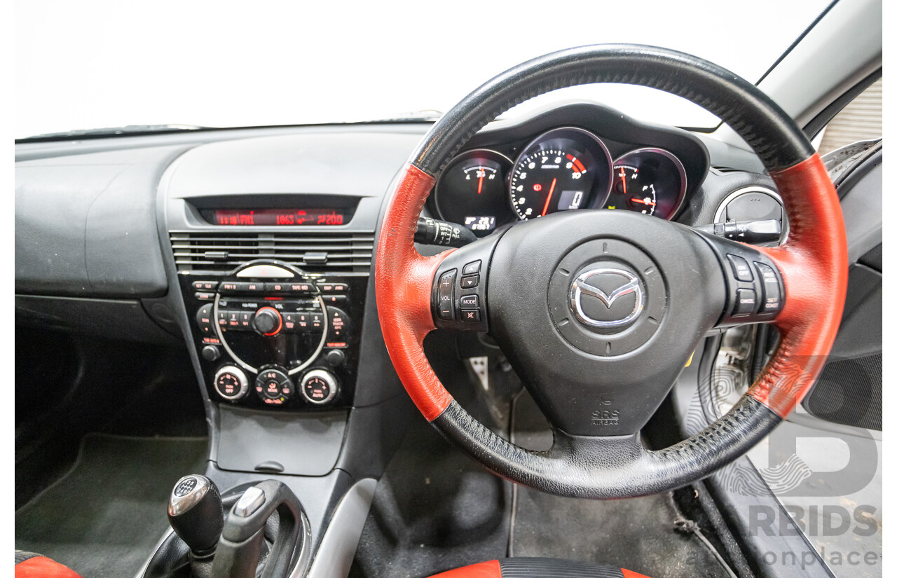 9/2005 Mazda RX-8 FE Series 1 4d Coupe Sunlight Silver Metallic 1.3L