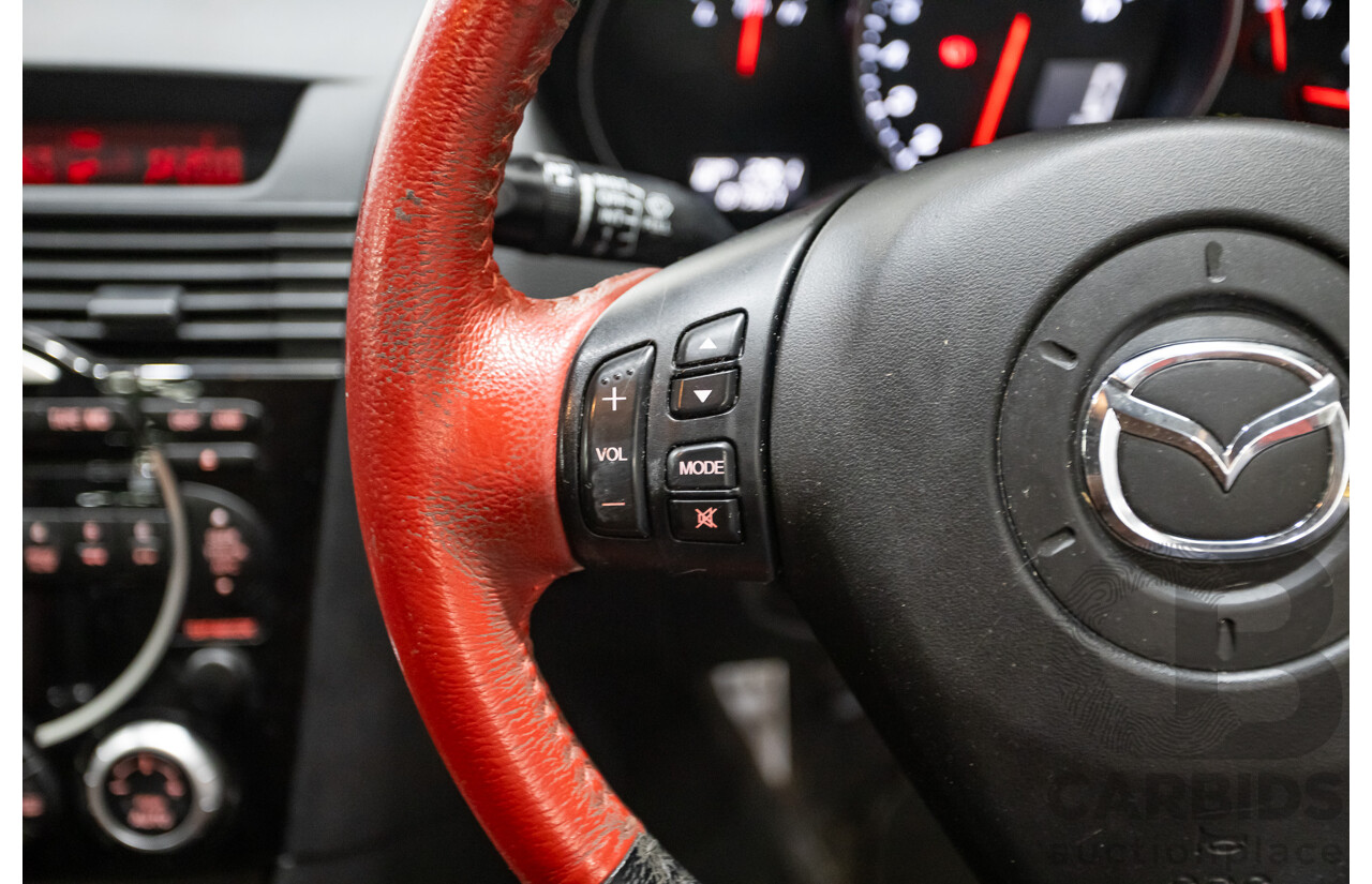 9/2005 Mazda RX-8 FE Series 1 4d Coupe Sunlight Silver Metallic 1.3L