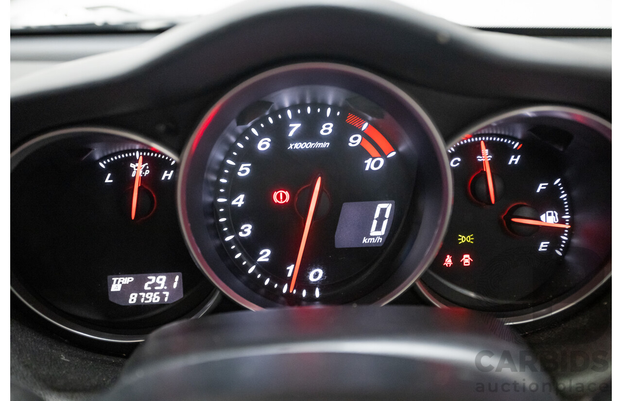 9/2005 Mazda RX-8 FE Series 1 4d Coupe Sunlight Silver Metallic 1.3L