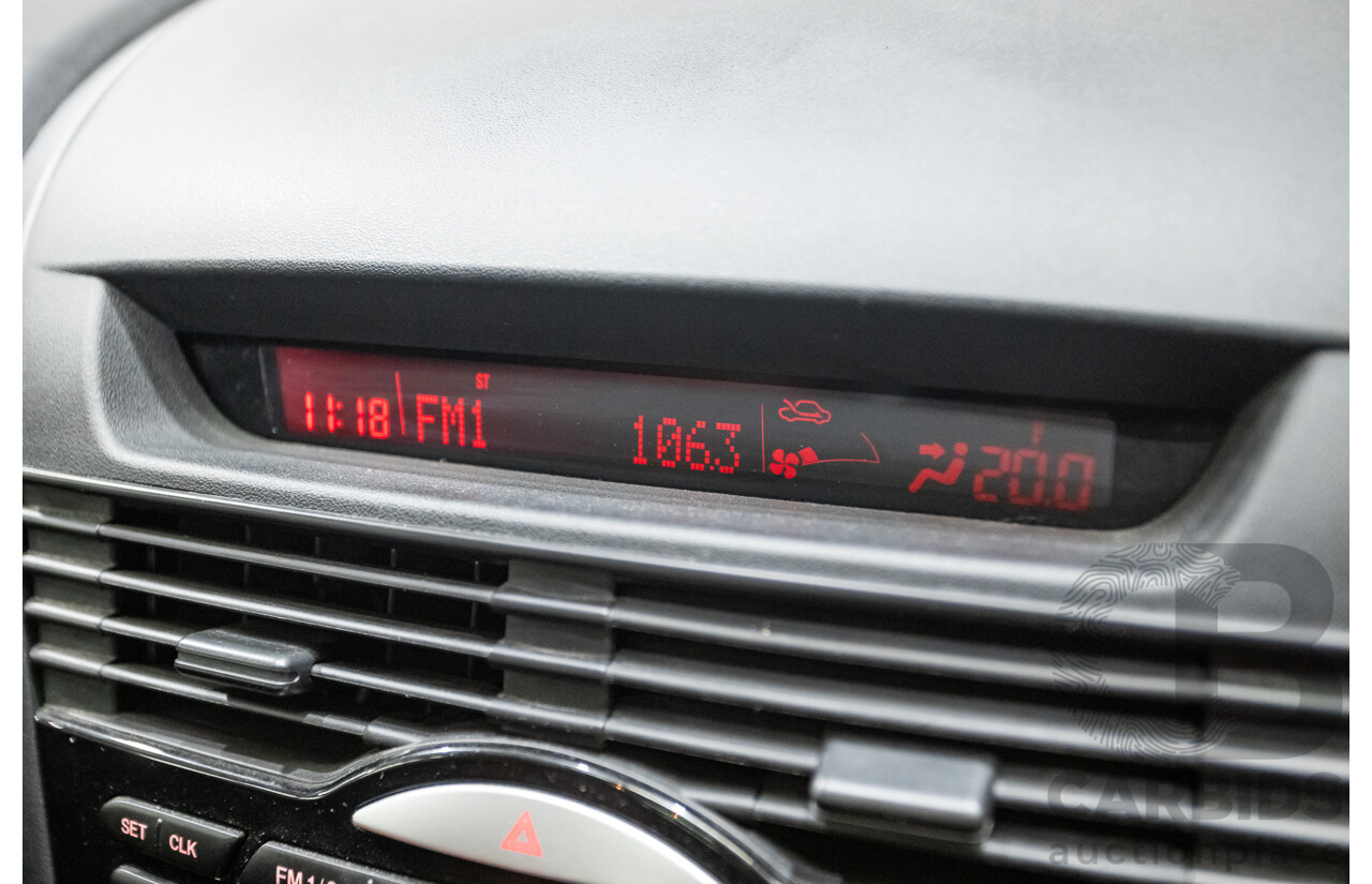 9/2005 Mazda RX-8 FE Series 1 4d Coupe Sunlight Silver Metallic 1.3L