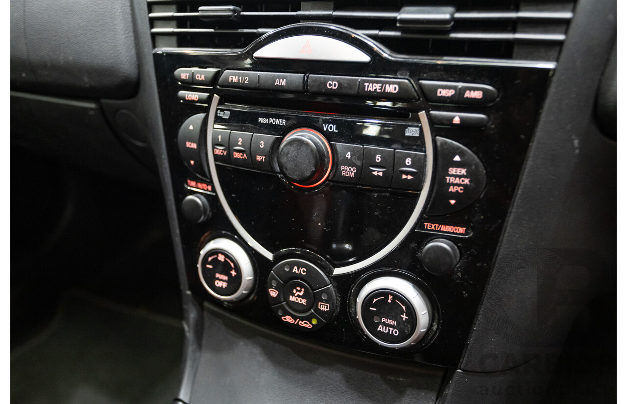 9/2005 Mazda RX-8 FE Series 1 4d Coupe Sunlight Silver Metallic 1.3L