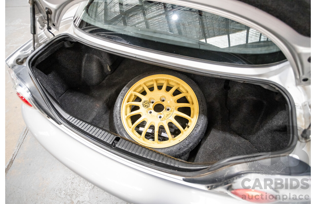 9/2005 Mazda RX-8 FE Series 1 4d Coupe Sunlight Silver Metallic 1.3L