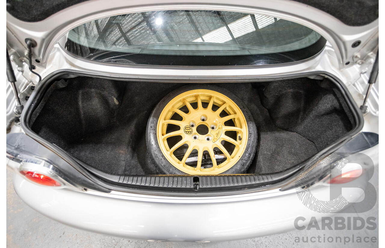 9/2005 Mazda RX-8 FE Series 1 4d Coupe Sunlight Silver Metallic 1.3L