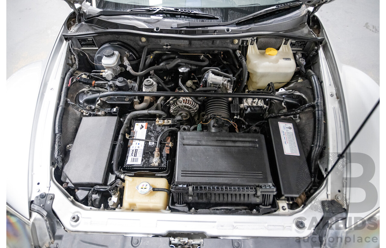 9/2005 Mazda RX-8 FE Series 1 4d Coupe Sunlight Silver Metallic 1.3L