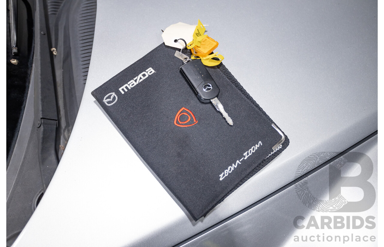 9/2005 Mazda RX-8 FE Series 1 4d Coupe Sunlight Silver Metallic 1.3L