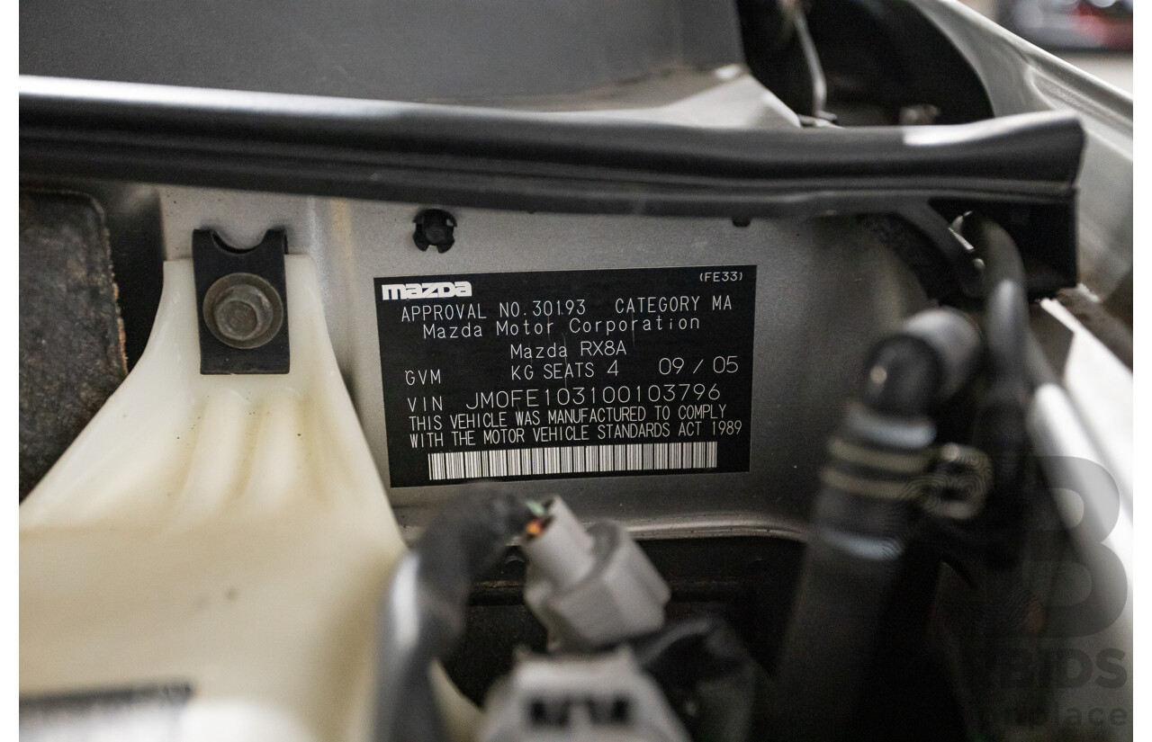 9/2005 Mazda RX-8 FE Series 1 4d Coupe Sunlight Silver Metallic 1.3L