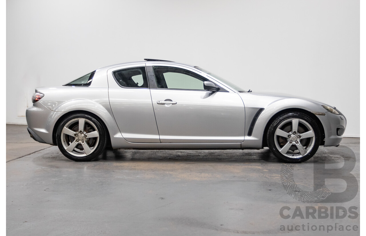 9/2005 Mazda RX-8 FE Series 1 4d Coupe Sunlight Silver Metallic 1.3L