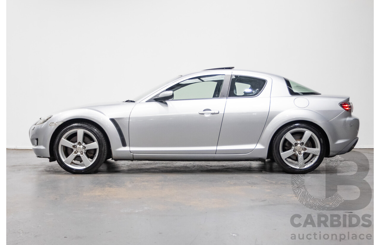 9/2005 Mazda RX-8 FE Series 1 4d Coupe Sunlight Silver Metallic 1.3L