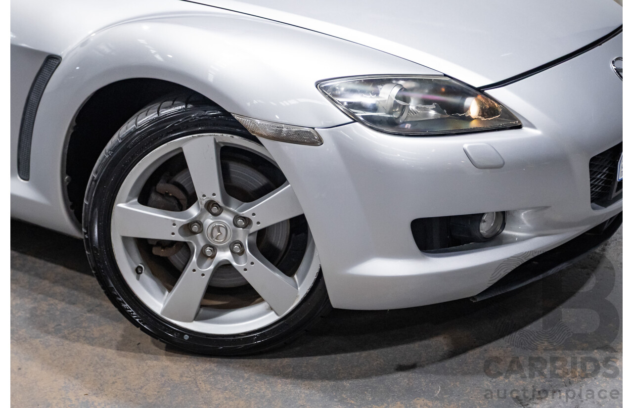 9/2005 Mazda RX-8 FE Series 1 4d Coupe Sunlight Silver Metallic 1.3L