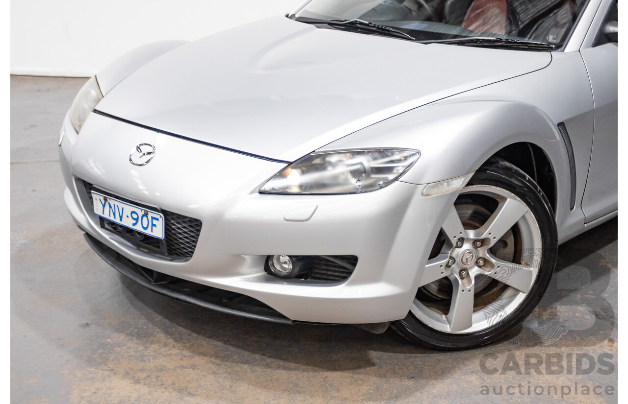 9/2005 Mazda RX-8 FE Series 1 4d Coupe Sunlight Silver Metallic 1.3L