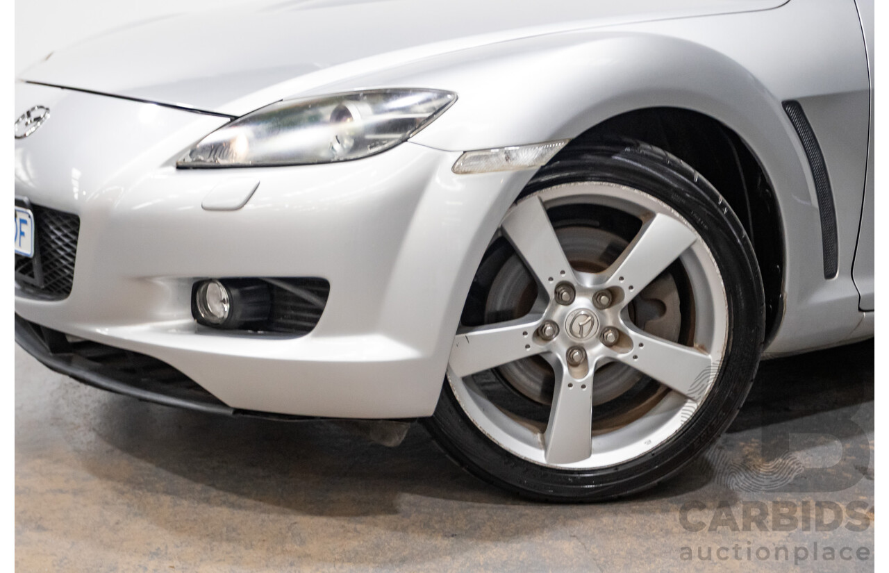 9/2005 Mazda RX-8 FE Series 1 4d Coupe Sunlight Silver Metallic 1.3L
