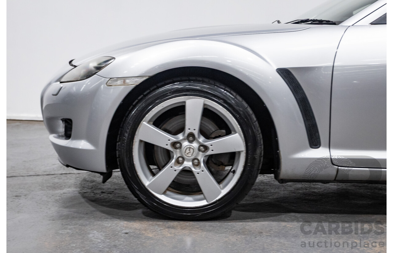 9/2005 Mazda RX-8 FE Series 1 4d Coupe Sunlight Silver Metallic 1.3L