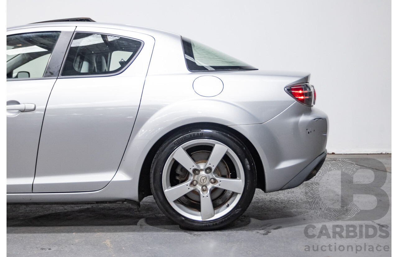9/2005 Mazda RX-8 FE Series 1 4d Coupe Sunlight Silver Metallic 1.3L