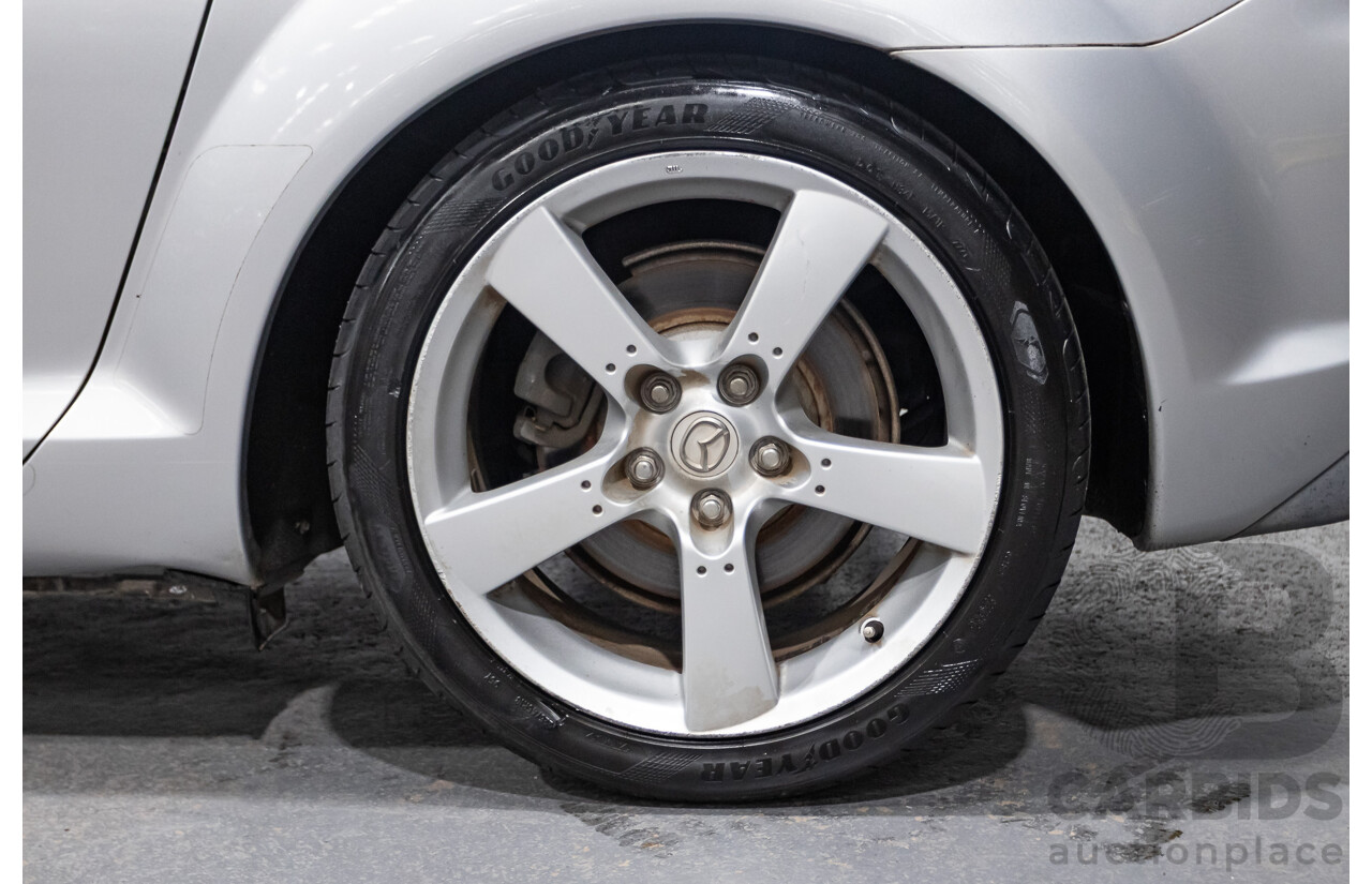 9/2005 Mazda RX-8 FE Series 1 4d Coupe Sunlight Silver Metallic 1.3L