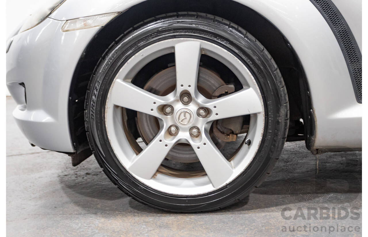 9/2005 Mazda RX-8 FE Series 1 4d Coupe Sunlight Silver Metallic 1.3L