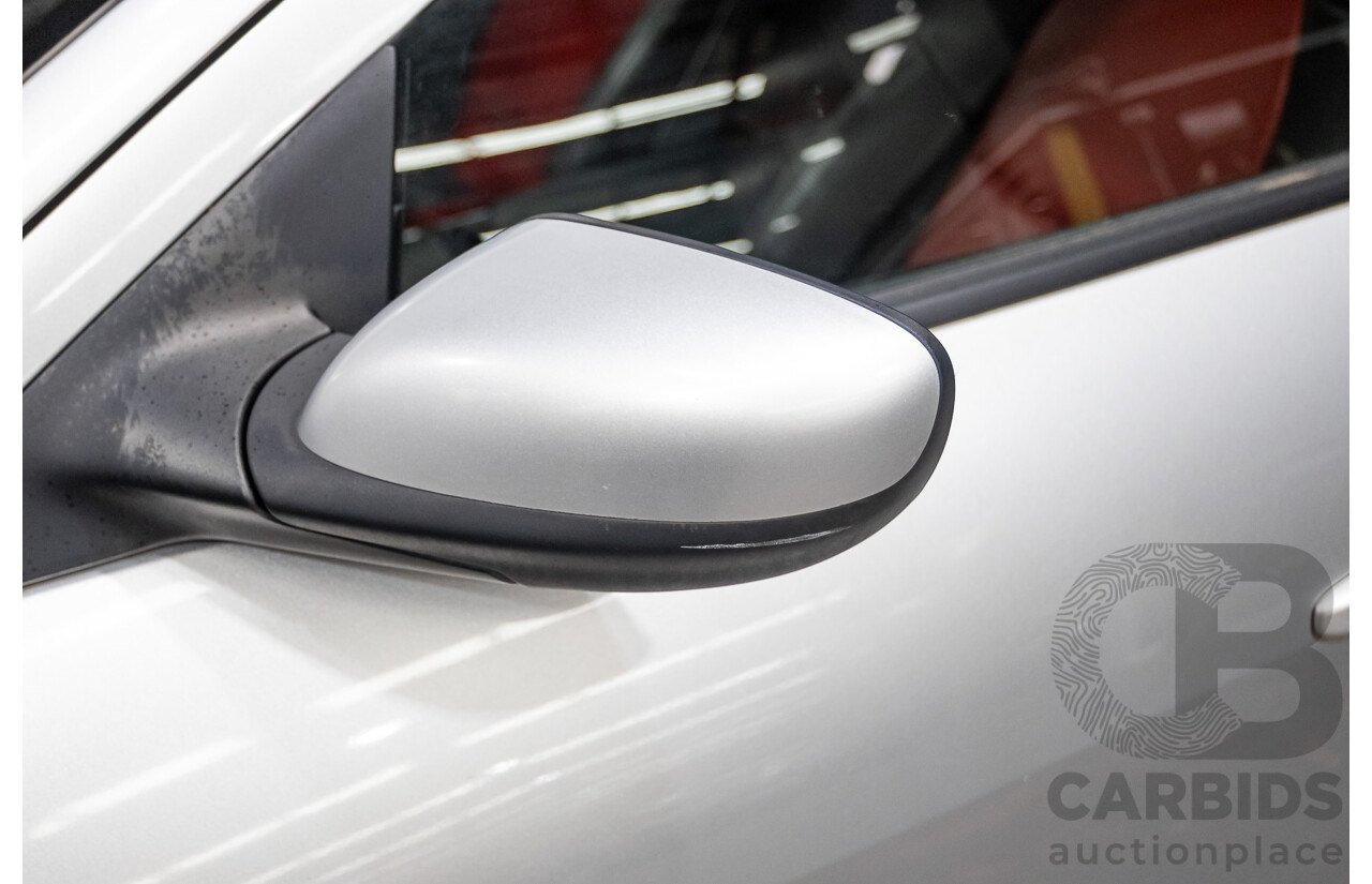 9/2005 Mazda RX-8 FE Series 1 4d Coupe Sunlight Silver Metallic 1.3L