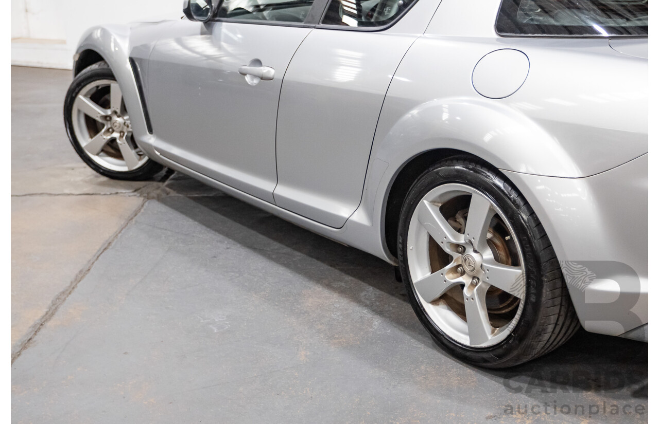 9/2005 Mazda RX-8 FE Series 1 4d Coupe Sunlight Silver Metallic 1.3L