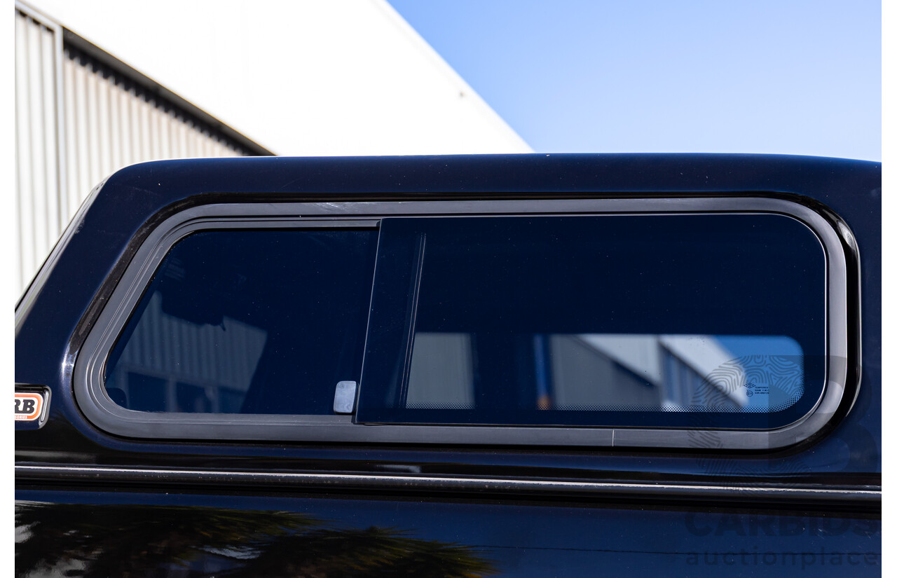 6/2012 Nissan Navara ST (4x4) D40 MY12 Dual Cab P/Up Midnight Black Metallic Turbo Diesel 2.5L