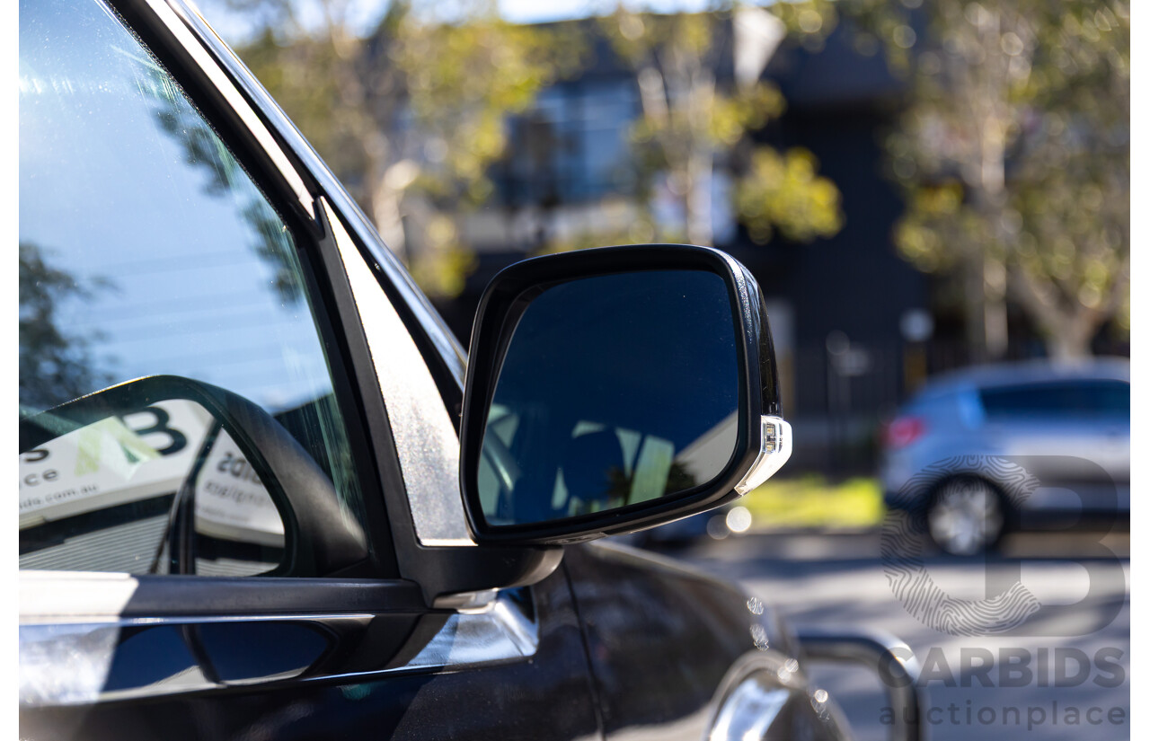6/2012 Nissan Navara ST (4x4) D40 MY12 Dual Cab P/Up Midnight Black Metallic Turbo Diesel 2.5L