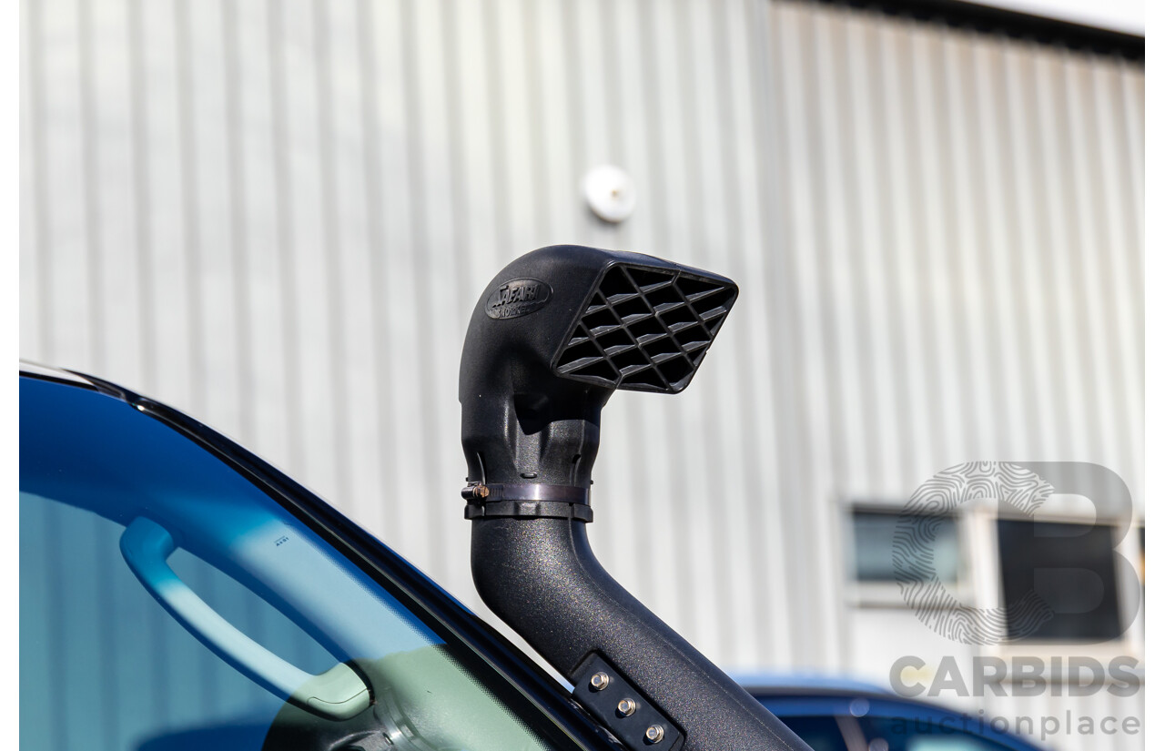 6/2012 Nissan Navara ST (4x4) D40 MY12 Dual Cab P/Up Midnight Black Metallic Turbo Diesel 2.5L