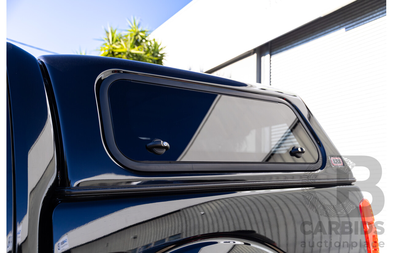 6/2012 Nissan Navara ST (4x4) D40 MY12 Dual Cab P/Up Midnight Black Metallic Turbo Diesel 2.5L