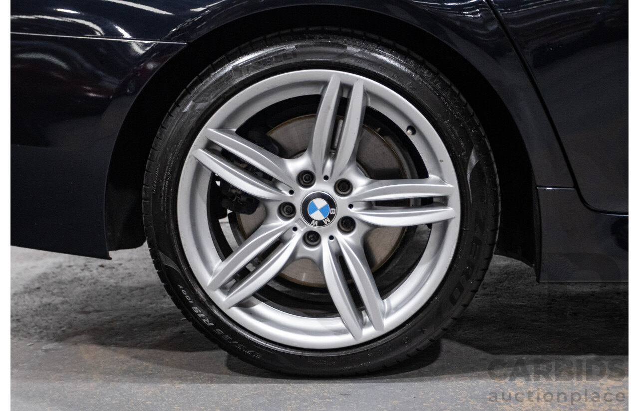 5/2014 BMW 550i LCI M-Sport F10 MY14 4d Sedan Carbon Black Metallic Twin Turbo V8 4.4L