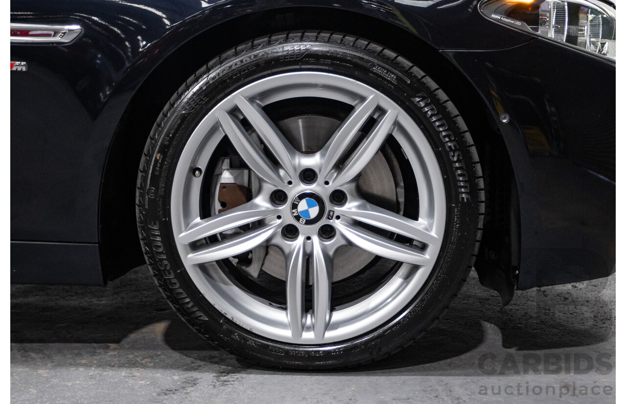 5/2014 BMW 550i LCI M-Sport F10 MY14 4d Sedan Carbon Black Metallic Twin Turbo V8 4.4L