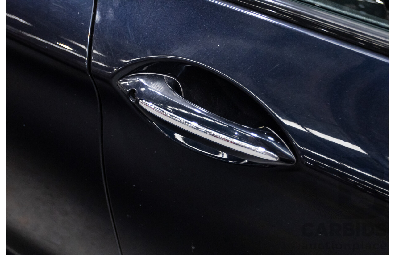 5/2014 BMW 550i LCI M-Sport F10 MY14 4d Sedan Carbon Black Metallic Twin Turbo V8 4.4L