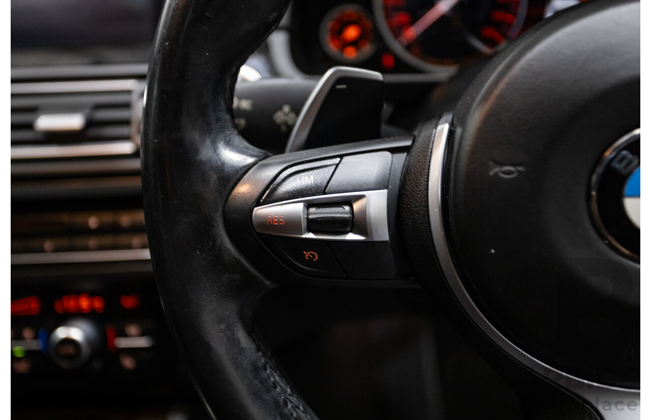 5/2014 BMW 550i LCI M-Sport F10 MY14 4d Sedan Carbon Black Metallic Twin Turbo V8 4.4L