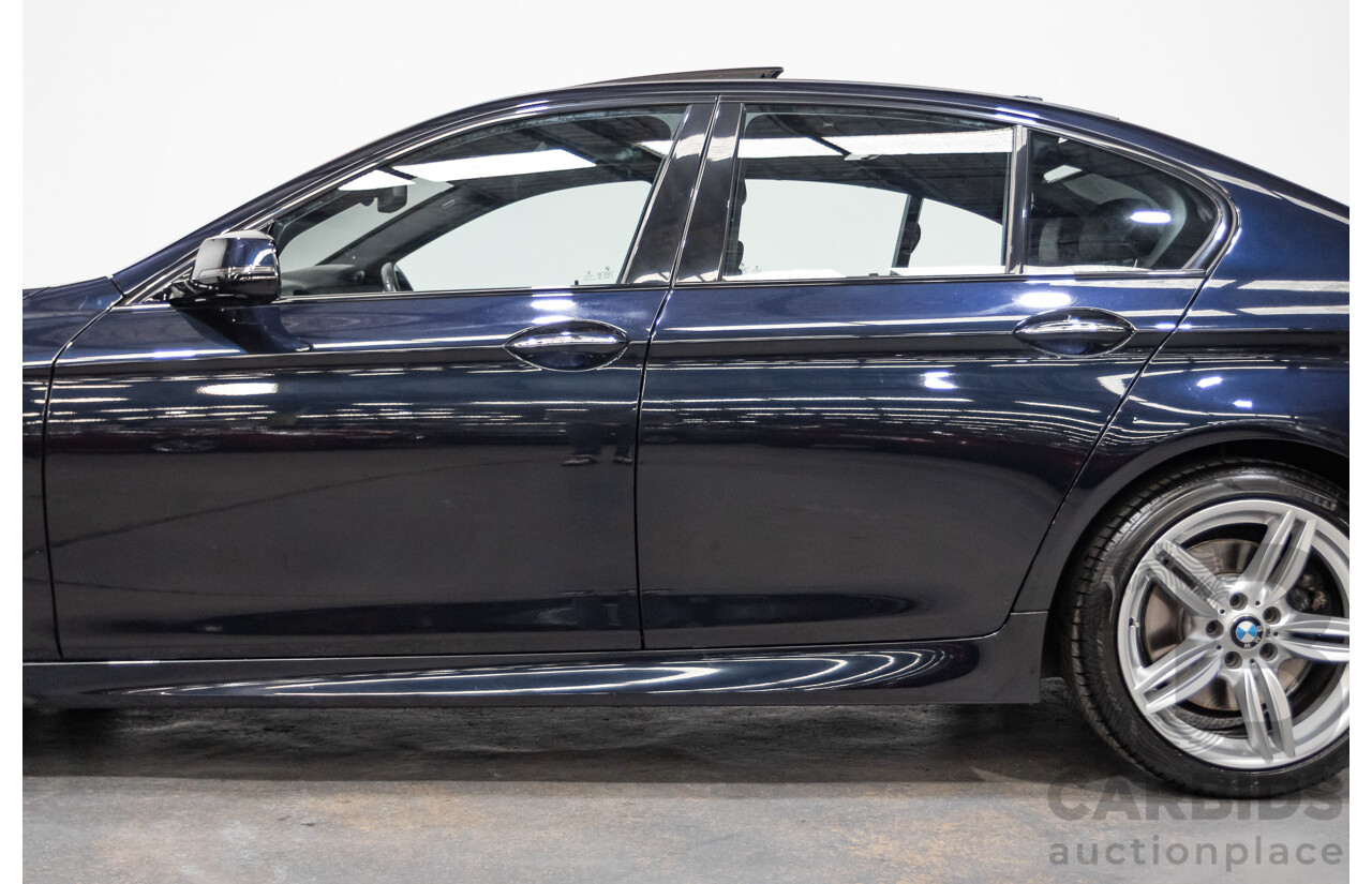 5/2014 BMW 550i LCI M-Sport F10 MY14 4d Sedan Carbon Black Metallic Twin Turbo V8 4.4L