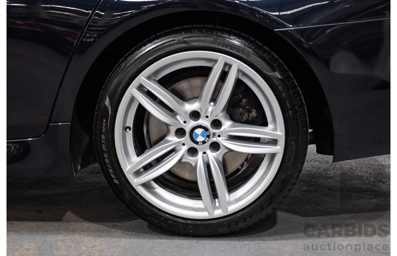 5/2014 BMW 550i LCI M-Sport F10 MY14 4d Sedan Carbon Black Metallic Twin Turbo V8 4.4L