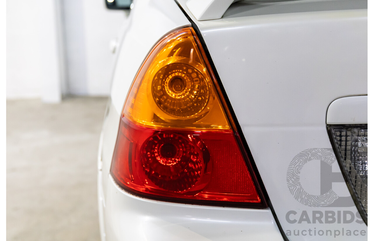 10/2005 Suzuki Liana 4d Sedan Superior White 1.8L