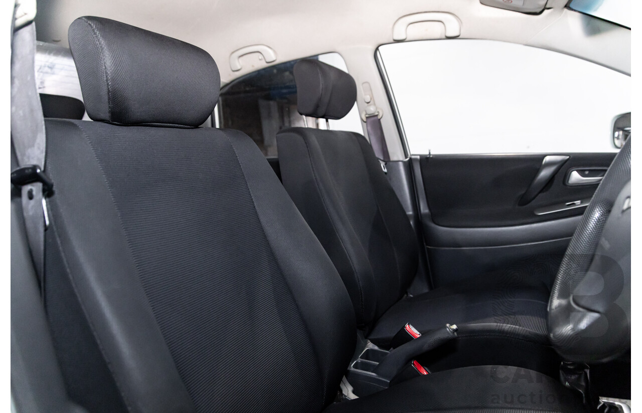 10/2005 Suzuki Liana 4d Sedan Superior White 1.8L